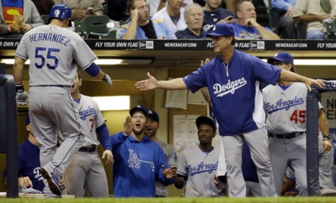 *Los Angeles Dodgers manager Don Mattingly, right, congratulates Ramon Hernandez--AP Photo-Morry Gash