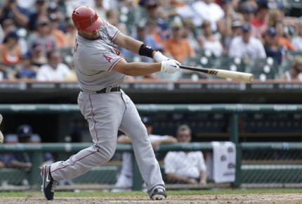 *Los Angeles Angels' Albert Pujols hits a one-run double against the Detroit Tigers in the 10th inning-AP Photo-Paul Sancya