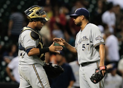 *Martin Maldonado #12 (L) and Francisco Rodriguez #57 of the--Texas. Scott Halleran-Getty Images-AFP