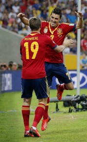 Spain's David Villa, right, is congratulated by teammate Nacho Monreal after scoring::AP Photo:Victor R. Caivano