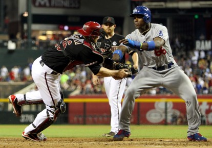 *Catcher Miguel Montero #26 of the Arizona Diamondbacks tags-- Christian Petersen-Getty Images-AFP