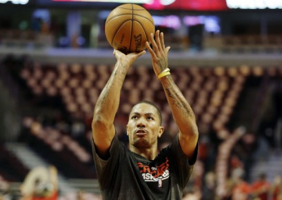 *Chicago Bulls point guard Derrick Rose warms up before Game 4 of an NBA basketball--AP Photo-Nam Y. Huh