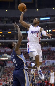 *Los Angeles Clippers guard Chris Paul, right, shoots over Memphis Grizzlies--AP Photo-Mark J. Terrill