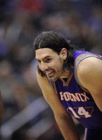 *Phoenix Suns forward Luis Scola (14), of Argentina, looks on during the second--AP Photo-Nick Wass