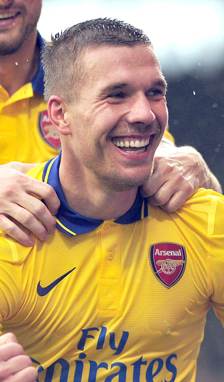 Podolski rescató al Arsenal en la jornada de ayer AFP / Carl Court 