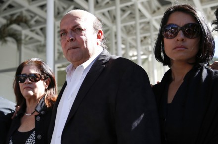 Spear and Mootz, parents of former Miss Venezuela Monica Spear, stand next to their daughter Carolina, as they attend to her Monica Spear's wake in Caracas