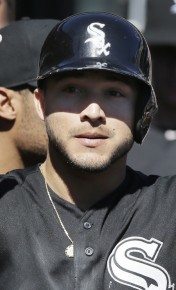 Chicago White Sox's Carlos Sanchez is congratulated after his solo homreun::AP Photo:Carlos Osorio