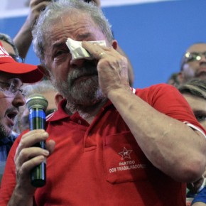 Brazilian former president Luiz Inacio Lula da Silva (C) wipes::AFP PHOTO : NELSON ALMEIDA