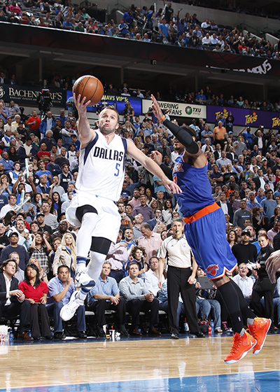 DALLAS, TX - MARCH 30: Jose Juan Barea #5 of the Dallas Mavericks goes in for the lay up against the New York Knicks on March 30, 2016 at the American Airlines Center in Dallas, Texas. NOTE TO USER: User expressly acknowledges and agrees that, by downloading and or using this photograph, User is consenting to the terms and conditions of the Getty Images License Agreement. Mandatory Copyright Notice: Copyright 2016 NBAE   Danny Bollinger/NBAE via Getty Images/AFP