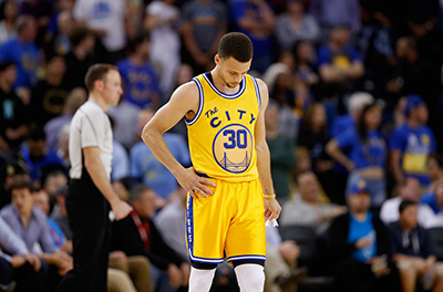 OAKLAND, CA - APRIL 05: Stephen Curry #30 of the Golden State Warriors stands on the court towards the end of their loss to Minnesota Timberwolves at ORACLE Arena on April 5, 2016 in Oakland, California. NOTE TO USER: User expressly acknowledges and agrees that, by downloading and or using this photograph, User is consenting to the terms and conditions of the Getty Images License Agreement.   Ezra Shaw/Getty Images/AFP