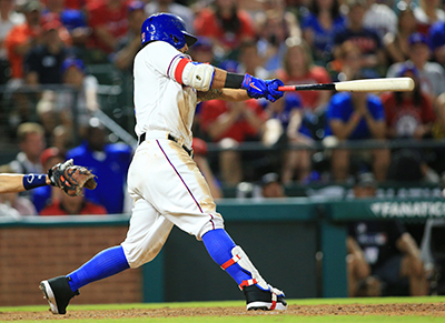 ARLINGTON, TX - JUNE 06: Rougned Odor #12 of the Texas Rangers hits a double for Beltre to score in the ninth inning against the Houston Astros at Globe Life Park in Arlington on June 6, 2016 in Arlington, Texas.   Rick Yeatts/Getty Images/AFP