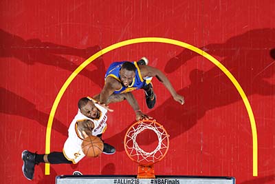 CLEVELAND, OH - JUNE 8: LeBron James #23 of the Cleveland Cavaliers drives to the basket against Draymond Green #23 of the Golden State Warriors in Game Three of the 2016 NBA Finals on June 8, 2016 at The Quicken Loans Arena in Cleveland, Ohio. NOTE TO USER: User expressly acknowledges and agrees that, by downloading and or using this photograph, user is consenting to the terms and conditions of Getty Images License Agreement. Mandatory Copyright Notice: Copyright 2016 NBAE   Andrew D. Bernstein/NBAE via Getty Images/AFP