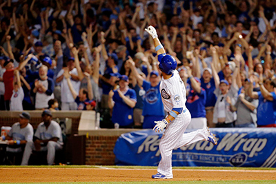 CHICAGO, IL - JUNE 19: Willson Contreras #40 of the Chicago Cubs celebrates after hitting a two run home run on the first pitch of his MLB debut during the sixth inning against the Pittsburgh Pirates at Wrigley Field on June 19, 2016 in Chicago, Illinois.   Jon Durr/Getty Images/AFP