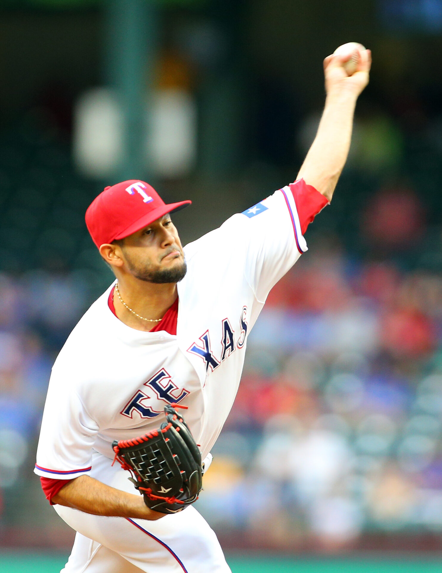 ARLINGTON, TX - AUGUST 15: Martin Perez #33 of the Texas Rangers throws in the first inning against the Oakland Athletics at Globe Life Park in Arlington on August 15, 2016 in Arlington, Texas.   Rick Yeatts/Getty Images/AFP