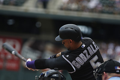 Colorado Rockies right fielder Carlos Gonzalez (5) in the first inning of a baseball game Sunday, July 24, 2016 in Denver. (AP Photo/David Zalubowski)