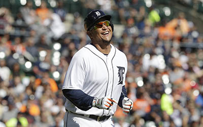 Detroit Tigers' Miguel Cabrera smiles as he runs to first on a base on balls during the fourth inning of a baseball game against the Kansas City Royals, Saturday, Sept. 24, 2016, in Detroit. (AP Photo/Carlos Osorio)