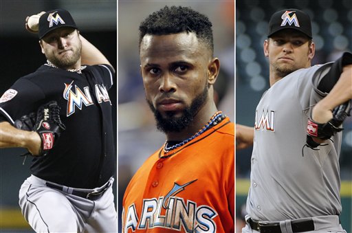 Este combinado de fotografías de archivo muestra a los peloteros de los Marlins de Miami, de izquierda a derecha, el lanzador Mark Buehrle, el campocorto dominicano José Reyes y el lanzador Josh Johnson. (Foto AP)