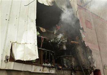 Estragos en un edificio palestino, tras el impacto de un mortero israelí en respuesta a los ataques de Hamas y de otras faacciones fundamentalistas