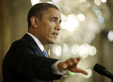 El presidente Barack Obama aparece durante una conferencia de prensa en el Salón Este de la Casa Blanca, en Washington, el lunes 14 de enero de 2013.