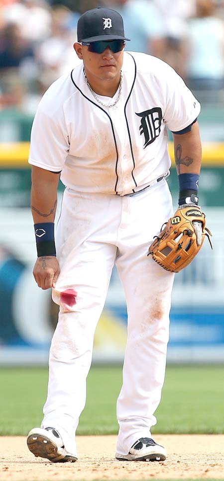 Miguel Cabrera #24 of the Detroit Tigers checks out his right leg after- Leon Halip-Getty Images-AFPweb