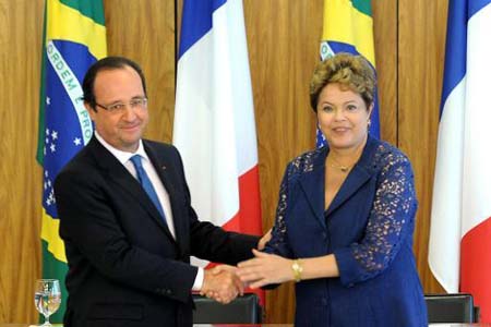 La presidenta de Brasil, Dilma Roussef y el presidente francés, François Hollande.
AFP / EVARISTO SA