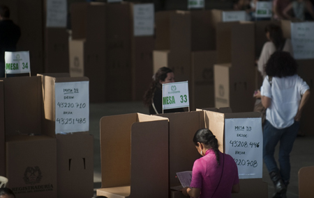 La jornada, en la que estaban convocados a votar 32 millones de colombianos, transcurrió con normalidad en casi todo el territorio
AFP / RAUL ARBOLEDA