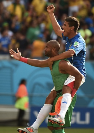 Costa Rica's goalkeeper Patrick Pemberton (L) and Costa Rica's defender Oscar Duarte celebrate after a Group D football match between Italy and Costa Rica at the Pernambuco Arena in Recife during the 2014 FIFA World Cup on June 20, 2014   AFP PHOTO / EMMANUEL DUNAND