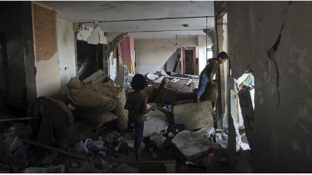 La imagen refleja una casa totalmente destruida por los ataques