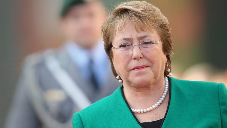 BERLIN, GERMANY - OCTOBER 27:  Chilean President  Michelle Bachelet reviews a guard of honour with German Chancellor Angela Merkel (not pictured) upon Bachelet's arrival at the Chancellery on October 27, 2014 in Berlin, Germany. Bachelet is on a two-day official visit to Germany, which includes a visit to Dresden, where Bachelet studied medicine as a student.  (Photo by Sean Gallup/Getty Images)