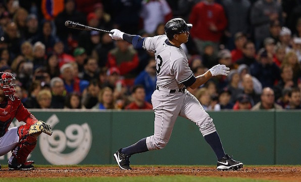 BOSTON, MA - MAY 1: Alex Rodriguez #13 hits 660th career home run to tie Willie Mays record during a game with Boston Red Sox in the 8th inning at Fenway Park May 1, 2015 in Boston, Massachusetts.   Jim Rogash/Getty Images/AFP