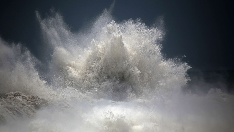 A wave is seen during a large ocean swell in Playa Azul, Coyuca de Benitez, Guerrero State, Mexico, on May 3, 2015. Three people were killed, one is missing and hundreds had to evacuate after strong waves lashed the Pacific coast of Latin American countries from Mexico to Chile. AFP PHOTO/ Pedro PARDO        (Photo credit should read Pedro PARDO/AFP/Getty Images)