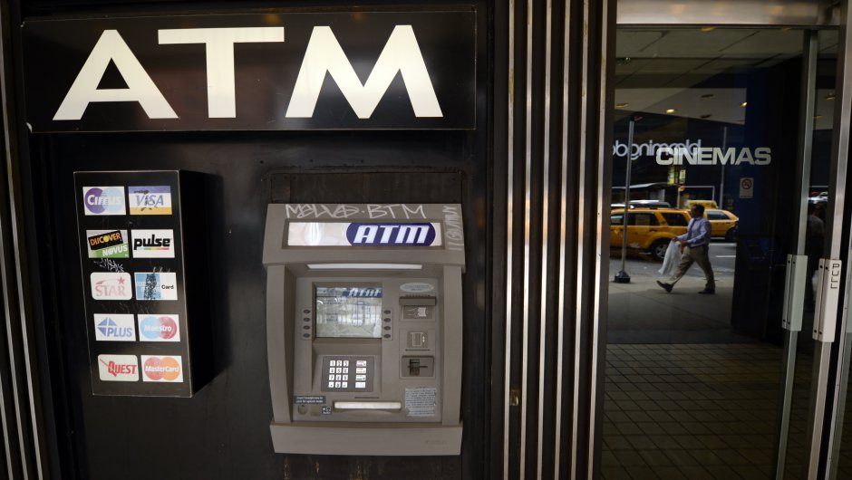 An ATM machine on Third Avenue is viewed in New York on May 10, 2013, just one of the many that were used as cyber thieves around the world stole $45 million by hacking into debit card companies, scrapping withdrawal limits and helping themselves from cash machines, US authorities said May 9, 2013.  The massive heist unfolded "in a matter of hours," said the US prosecutor's office for Brooklyn, New York. Prosecutors unveiled charges against eight people accused of forming the New York cell of the plot, which stretched across 26 countries. In their case, they allegedly lifted $2.8 million in cash and now face charges of conspiracy to commit access device fraud and money laundering. Seven of the eight have been arrested, the US attorney's office said. The eighth, Alberto Yusi Lajud-Pena, who was the leader and was nicknamed "Prime" and "Albertico," is reported to have been murdered two weeks ago, the office said. AFP PHOTO / TIMOTHY A. CLARY        (Photo credit should read TIMOTHY A. CLARY/AFP/Getty Images)