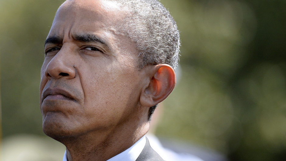 WASHINGTON, DC - MAY 15:  U.S. President Barack Obama reflects during the National Peace Officers Memorial Service on May 15, 2015 at the US Capitol in Washington, DC.  The ceremony, held since 1982, comes near the end of Police Week, a 53-year-old event first officially recognized in 1962 by President John F. Kennedy. The National Law Enforcement Officers Memorial Fund reported that 126 law enforcement officers died in the line of duty last year, compared with 102 in 2013.   (Photo by Olivier Douliery - Pool/Getty Images)