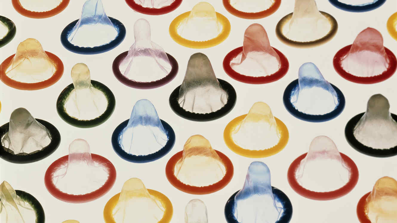 Collection of muticoloured  condoms, close-up