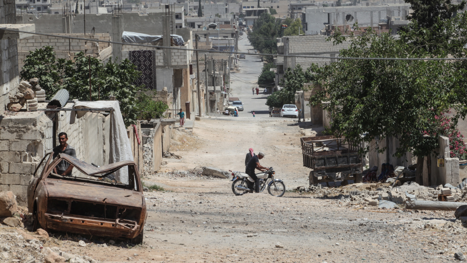 KOBANE, SYRIA - JUNE 20: (TURKEY OUT) The picture shows the wreckage left by fighting on a street in the center of the Syrian town of Kobane, also known as Ain al-Arab, Syria. June 20, 2015. Kurdish fighters with the YPG took full control of Kobane and strategic city of Tal Abyad, dealing a major blow to the Islamic State group's ability to wage war in Syria. Mopping up operations have started to make the town safe for the return of residents from Turkey, after more than a year of Islamic State militants holding control of the town. (Photo by Ahmet Sik/Getty Images)