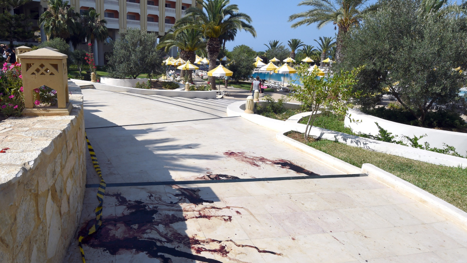 A blood stain covers the ground in the resort town of Sousse, a popular tourist destination 140 kilometres (90 miles) south of the Tunisian capital, on June 26, 2015. At least 27 people, including foreigners, were killed in a mass shooting at a Tunisian beach resort packed with holidaymakers, in the North African country's worst attack in recent history. AFP PHOTO / FETHI BELAID        (Photo credit should read FETHI BELAID/AFP/Getty Images)