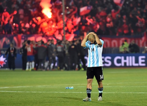 Argentina's midfielder Javier Mascherano reacts after losing in the 2015 Copa America final football match penalty shootout against Chile, in Santiago, Chile, on July 4, 2015. Chile won 4-1 (0-0).  AFP PHOTO / NELSON ALMEIDA