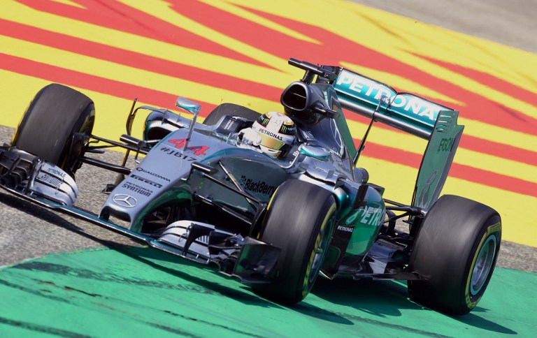 Mercedes AMG Petronas F1 Team's British driver Lewis Hamilton competes during the second practice session of the Hungarian Grand Prix Formula One race on July 24, 2015 at the Hungaroring racetrack in Mogyorod.  AFP PHOTO / ATTILA KISBENEDEK