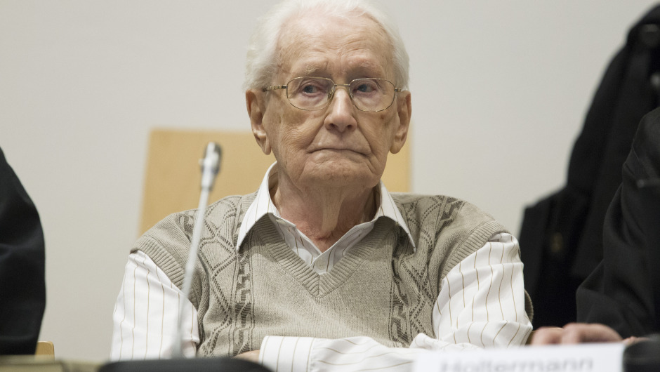 LUNEBURG, GERMANY - 21 APRIL:  Oskar Groening, 93, arrives for the first day of his trial to face charges of being accomplice to the murder of 300,000 people at the Auschwitz concentration camp on April 21, 2015 in Lueneburg, Germany. Groening was an accountant with the Waffen SS and has been open about his role, claiming in interviews with media that he accepts his moral responsibility. Groening has also written an account of his experience, in what he claims is an effort to counter Holocaust revisionists. State prosecutors accuse Groening of accomplice in the murder of 300,000 Hungarian Jews who arrived at Auschwitz in 1944.  (Photo by Andreas Tamme - Pool/Getty Images)