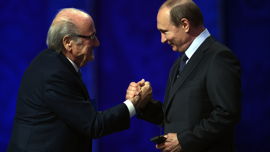 SAINT PETERSBURG, RUSSIA - JULY 25:  FIFA President Joseph S. Blatter shakes hands with Vladimir Putin, President of Russia during the Preliminary Draw of the 2018 FIFA World Cup in Russia at The Konstantin Palace on July 25, 2015 in Saint Petersburg, Russia.  (Photo by Dennis Grombkowski/Getty Images)