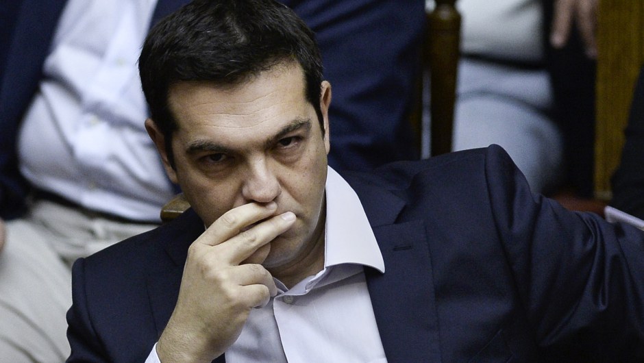 Greek Prime Minister Alexis Tsipras attends a parliamentary session in Athens on June 27, 2015. Greece will hold a referendum on July 5 on the outcome of negotiations with its international creditors taking place in Brussels on June 27, Prime Minister Alexis Tsipras announced. AFP PHOTO / ANGELOS TZORTZINIS        (Photo credit should read ANGELOS TZORTZINIS/AFP/Getty Images)