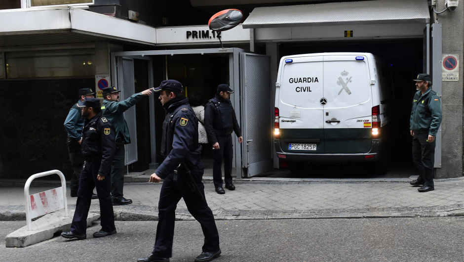 A Spanish Civil Guard van carrying people suspected of links to the Islamic State group, arrives at the Spanish National Court in Madrid on April 10, 2015 after their arrest on two days ago. Spanish police arrested 10 people in the Barcelona and Tarragona areas on April 8, in raids seeking to stop young people travelling to Iraq and Syria to fight with the violent extremist group.   AFP PHOTO/ GERARD JULIEN        (Photo credit should read GERARD JULIEN/AFP/Getty Images)