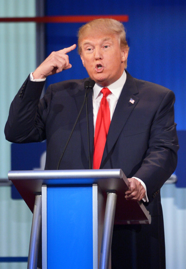 Real estate tycoon Donald Trump participates in the Republican presidential primary debate on August 6, 2015 at the Quicken Loans Arena in Cleveland, Ohio. AFP PHOTO / MANDEL NGAN        (Photo credit should read MANDEL NGAN/AFP/Getty Images)