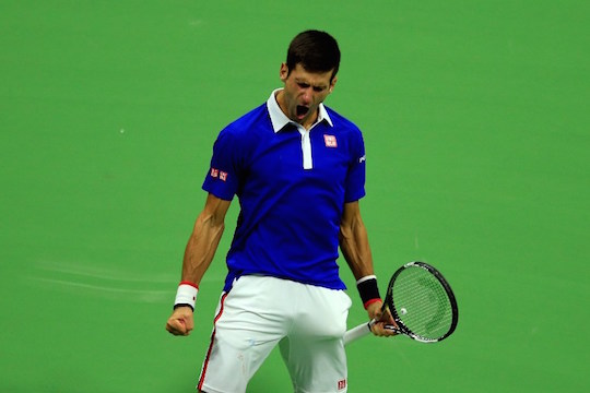 NEW YORK, NY - SEPTEMBER 13: Novak Djokovic of Serbia celebrates a point against Roger Federer of Switzerland during their Men's Singles Final match on Day Fourteen of the 2015 U.S. Open at the USTA Billie Jean King National Tennis Center on September 13, 2015 in the Flushing neighborhood of the Queens borough of New York City.   Chris Trotman/Getty Images for the USTA/AFP