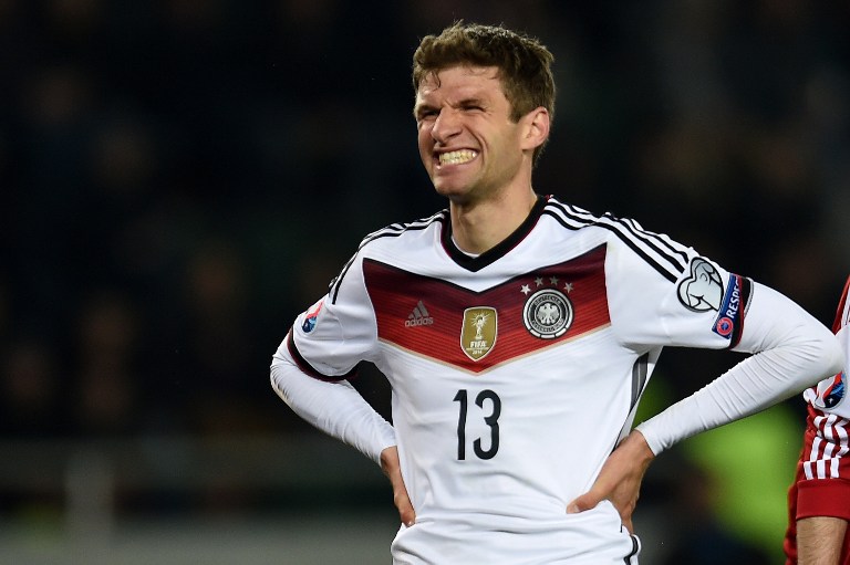 Germany's Thomas Mueller reacts during the Euro 2016 qualifying football match between Georgia and Germany at the Boris-Paitschadse-Stadium in Tbilisi , Georgia on March 29, 2015.  AFP PHOTO / PATRIK STOLLARZ