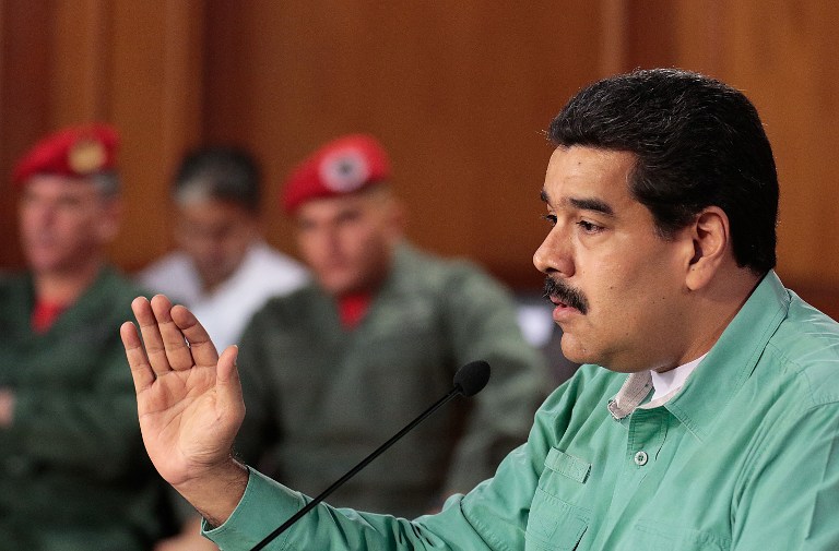 Handout picture released by the Venezuelan presidency showing Venezuelan President Nicolas Maduro talking during a television programme in Caracas on January 4, 2015. Maduro said he ordered the state security bodies to ensure the peaceful installation of the National Assembly, whose control will assume the opposition for the first time in 17 years.    AFP PHOTO / PRESIDENCIA / HO   ---  RESTRICTED TO EDITORIAL USE - MANDATORY CREDIT "AFP PHOTO / PRESIDENCIA / HO" - NO MARKETING NO ADVERTISING CAMPAIGNS - DISTRIBUTED AS A SERVICE TO CLIENTS - GETTY OUT / AFP / PRESIDENCIA VENEZUELA / --