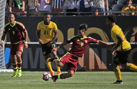 Venezuela's Josef Martinez kicks the ball during the Copa America Centenario football tournament match against Jamaica in Chicago, Illinois, United States, on June 5, 2016.  / AFP PHOTO / Tassos Katopodis