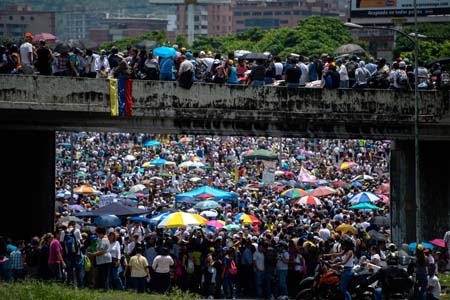 La lluvia caraqueña no pudo contra los manifestantes
Federico Parra / AFP