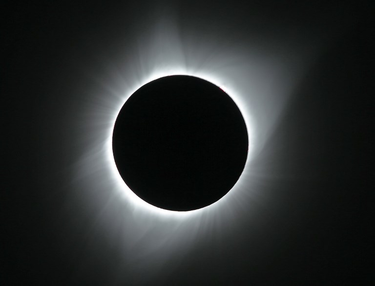 JACKSON, WY - AUGUST 21: The sun is is in full eclipse over Grand Teton National Park on August 21, 2017 outside Jackson, Wyoming. Thousands of people have flocked to the Jackson and Teton National Park area for the 2017 solar eclipse which will be one of the areas that will experience a 100% eclipse on Monday August 21, 2017.   George Frey/Getty Images/AFP
