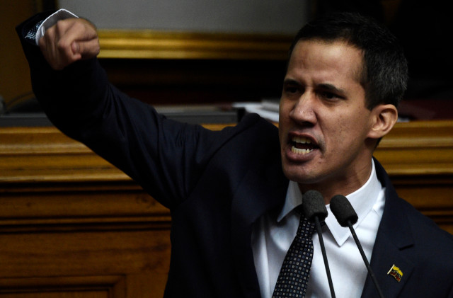 The new president of Venezuela's National Assembly Juan Guaido speaks during the inauguration ceremony in Caracas on January 5, 2019. - The opposition-controlled National Assembly will declare illegitimate the new presidential term of Nicolas Maduro, due to start January 10, a symbolic decision that could further divide the opponents of the government. (Photo by Federico Parra / AFP)